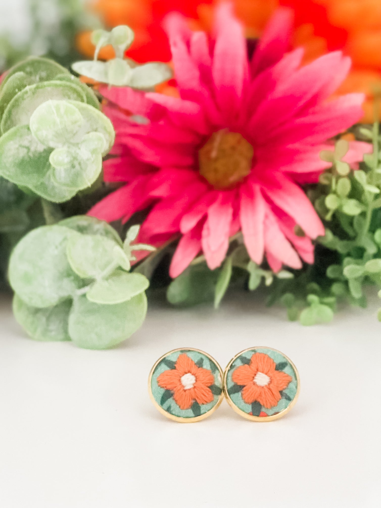 Round stud earrings, hand-embroidered