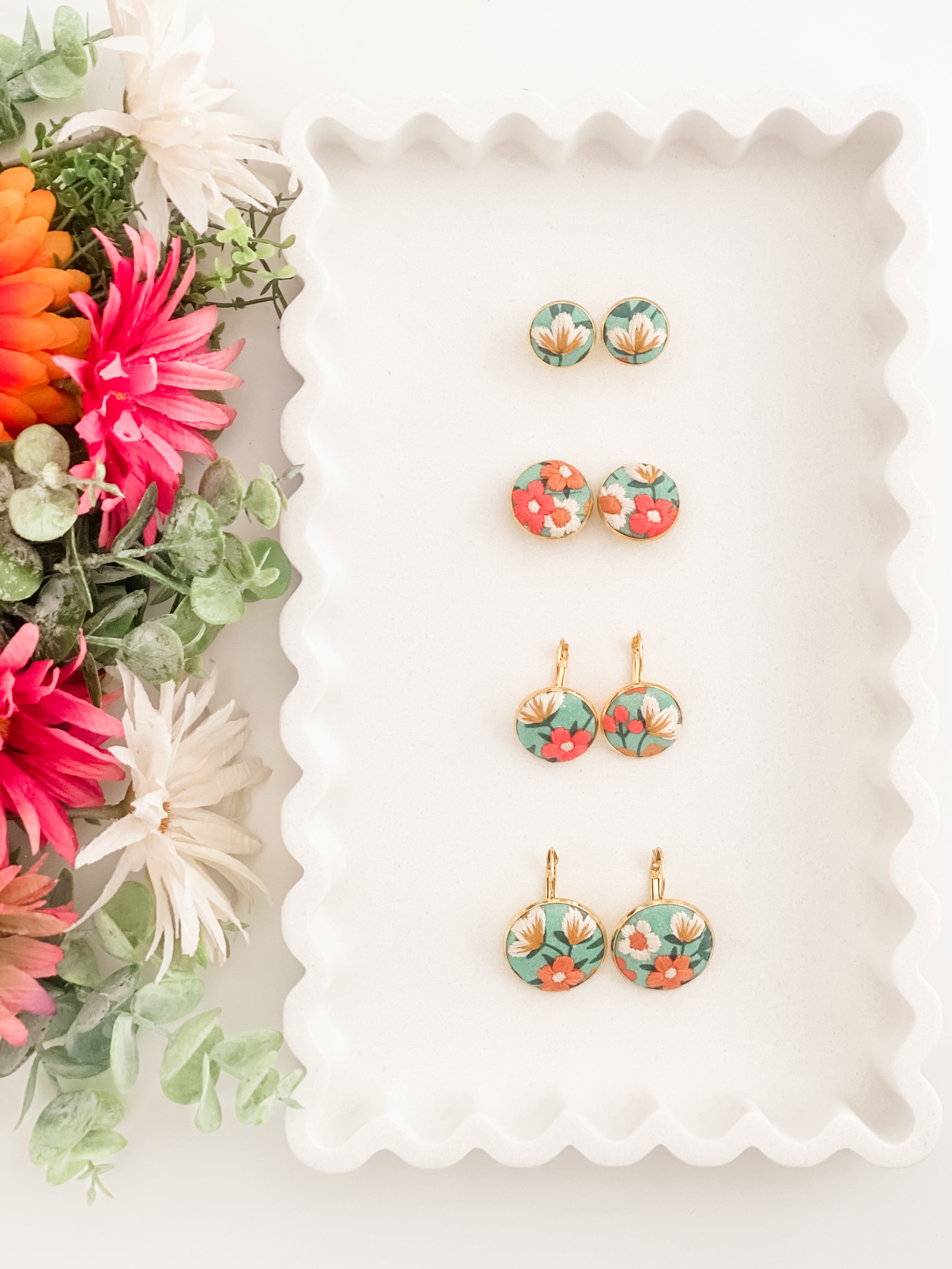 Round clip-on earrings, hand-embroidered