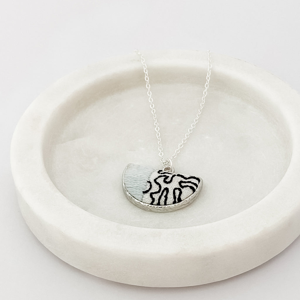 Kuro embroidered abstract earrings and necklace set